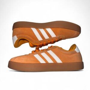 adidas Women's Vibrant Orange Sneakers with White Stripes